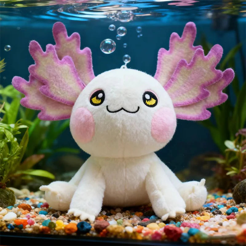Plush kawaii axolotl toy with pink gills in an aquarium setting