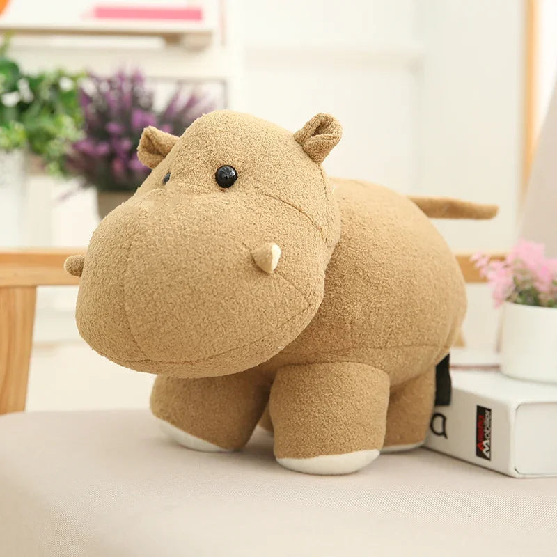 Plush hippo kawaii toy on a surface with a blurred indoor background