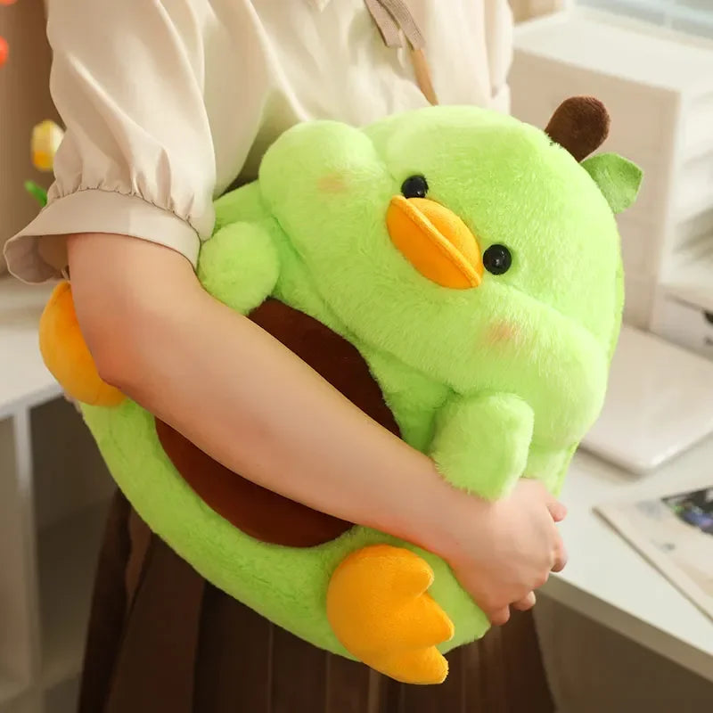 Person holding a green kawaii plush toy resembling a duck in an indoor setting.