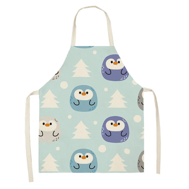 Children's apron with penguin Kawaii design on a light blue background