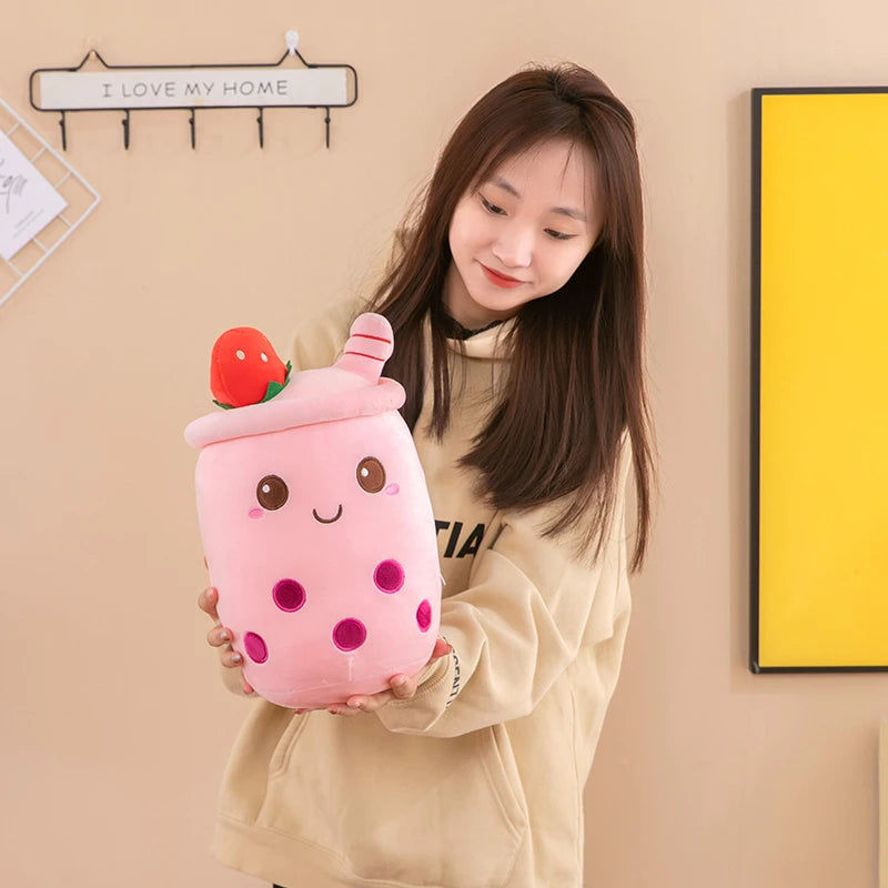 Woman holding a boba tea kawaii plush toy