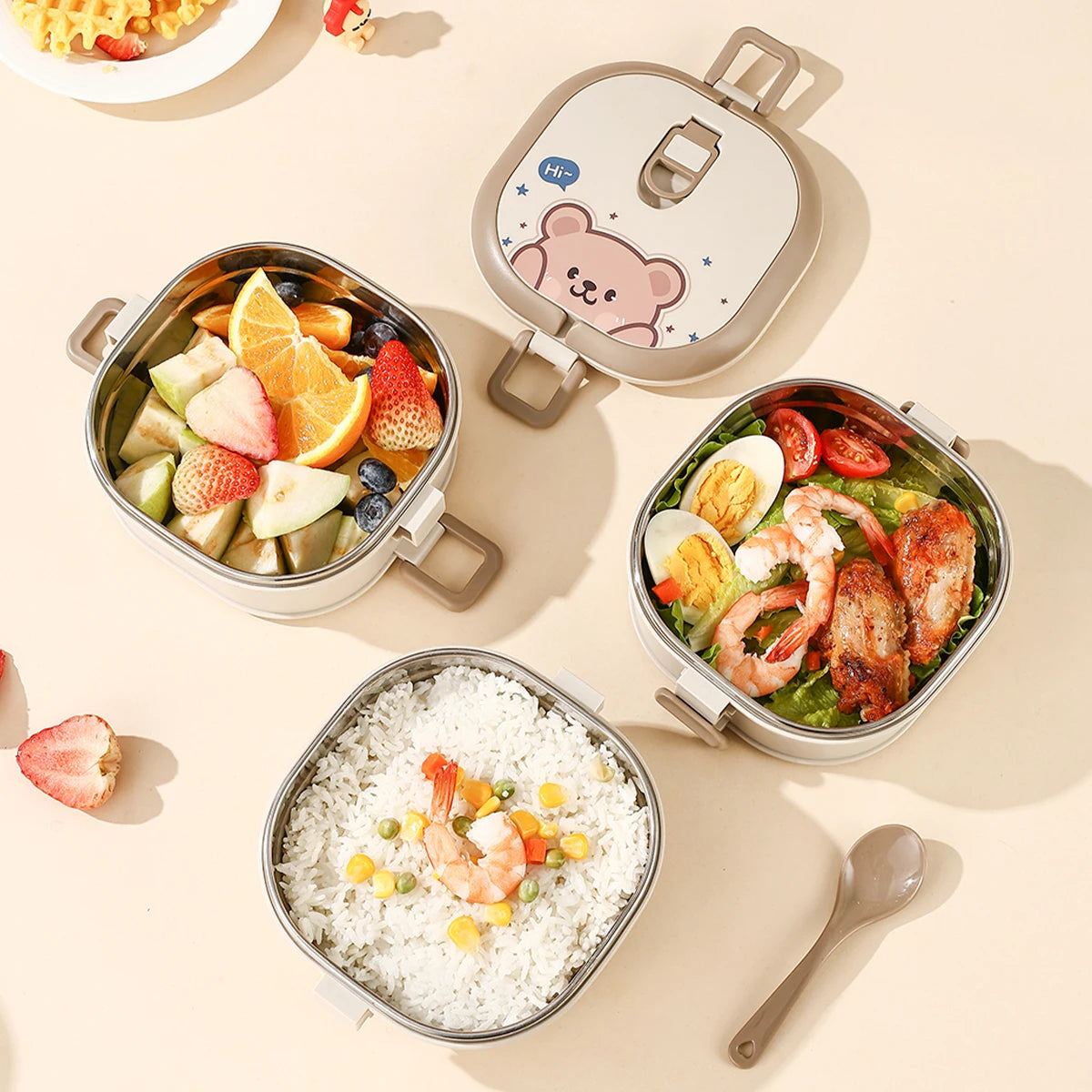 Set of kawaii bento boxes with food on a beige background