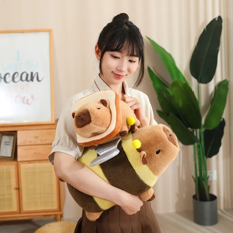 Person holding a kawaii plush toy resembling a cartoon character in a room with a plant and framed picture.