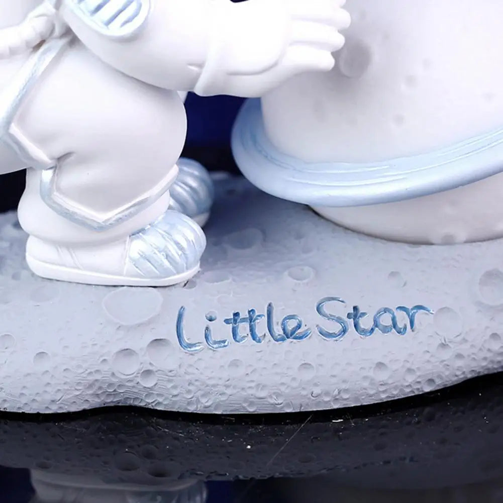 White ceramic kawaii  figurine with 'Little Star' text on a textured surface