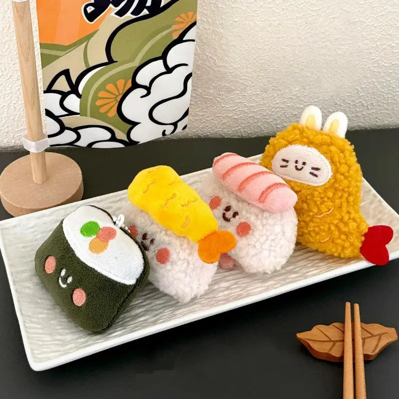 Plush toys shaped like kawaii sushi on a white plate with a decorative background
