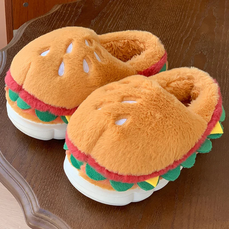 Hamburger-shaped kawaii slippers on a wooden surface