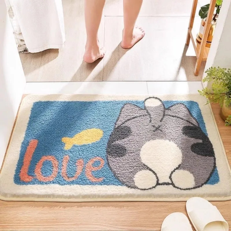 Cat-shaped Kawaii doormat with 'love' and fish design on a wooden floor.