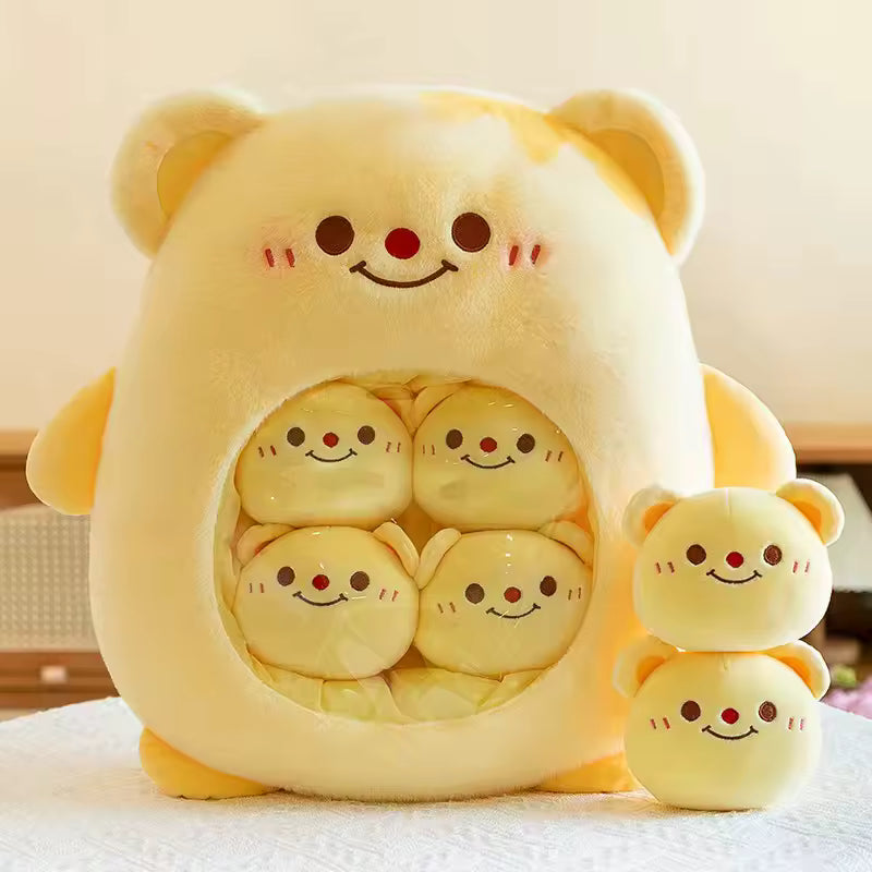 Cute kawaii plush toy with multiple faces inside a larger plush bear, on a light background.
