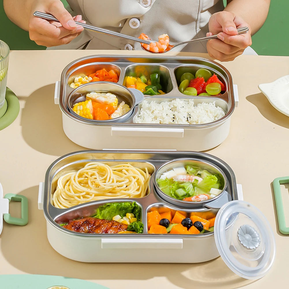 Two compartmentalized kawaii lunch box with various food items on a table.