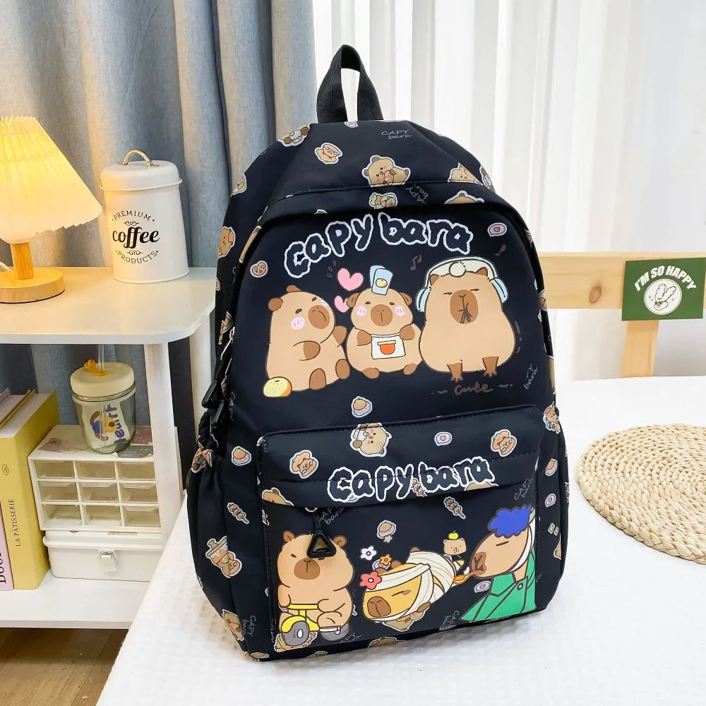 Backpack with Kawaii cartoon bear designs on a white surface