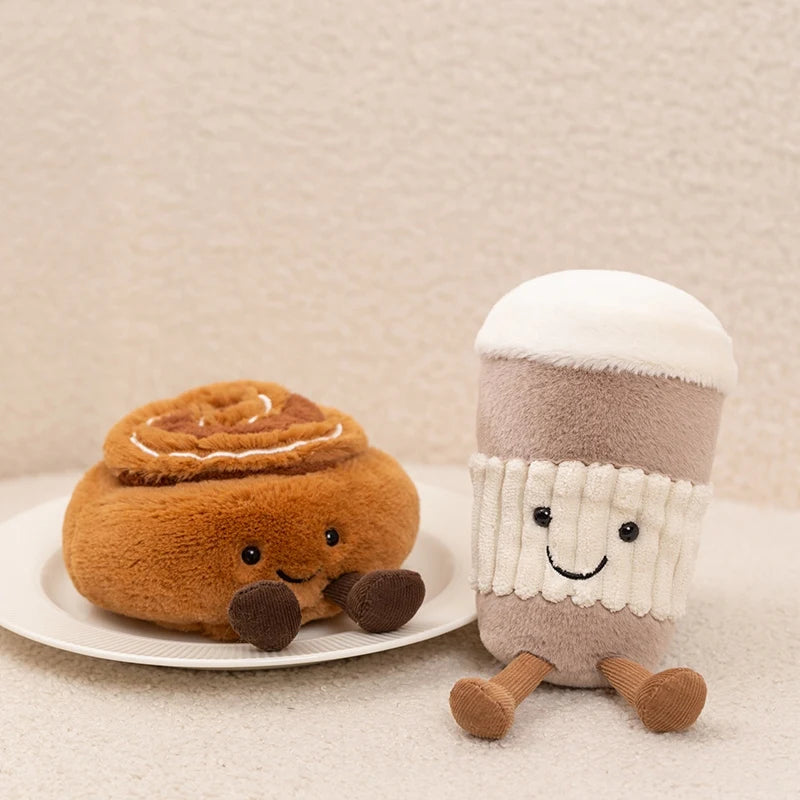 Plush kawaii toy cinnamon roll and marshmallow character on a neutral background