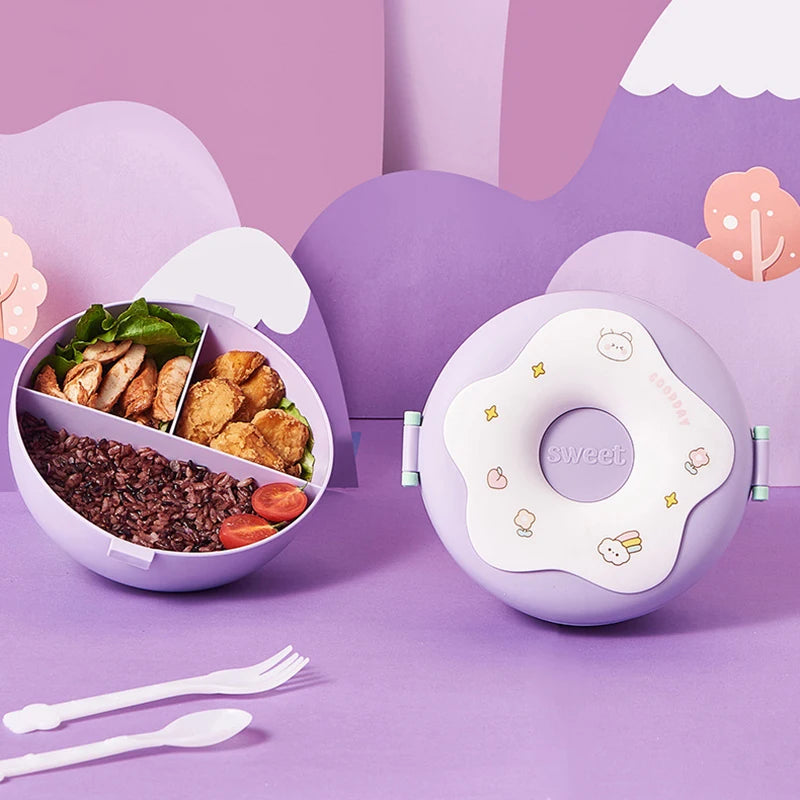 Purple kawaii lunch box with compartments filled with food on a matching purple background