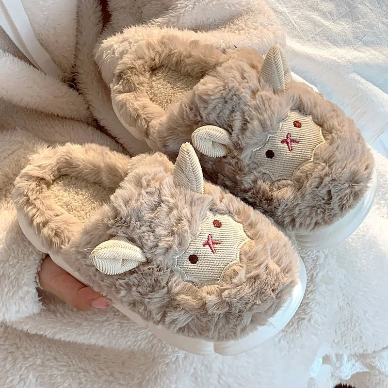 Pair of fluffy kawaii slippers with animal design on a soft surface