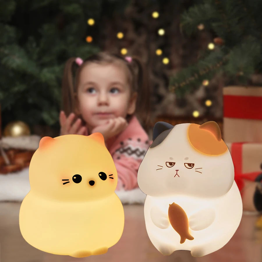 Two cat-shaped kawaii night lights with a child in the background.