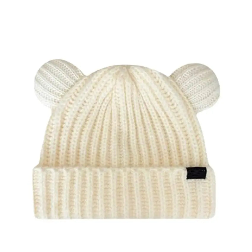 Beige knit beanie with Kawaii bear ears on a white background