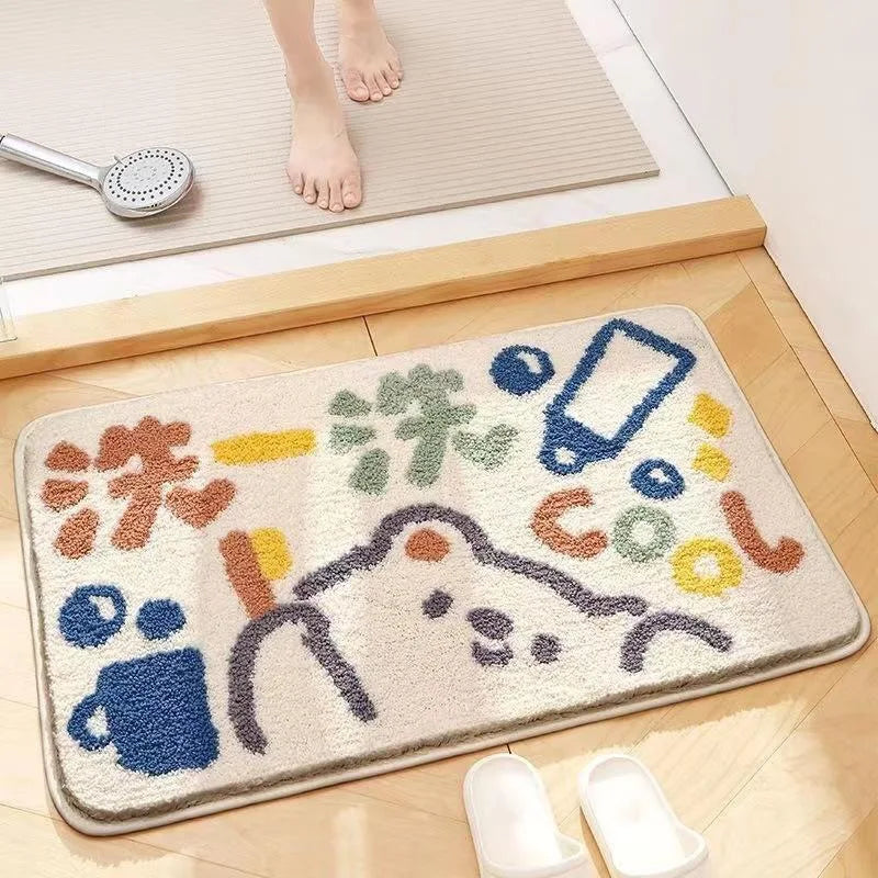 Colorful bath mat with abstract Kawaii designs on a bathroom floor.