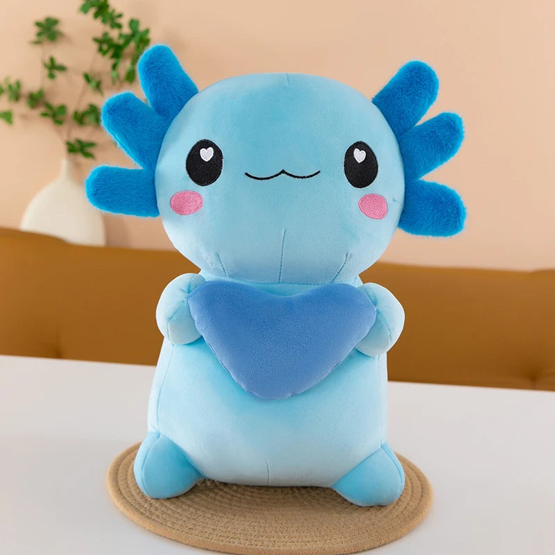 Blue axolotl kawaii plush toy with a heart on a beige background