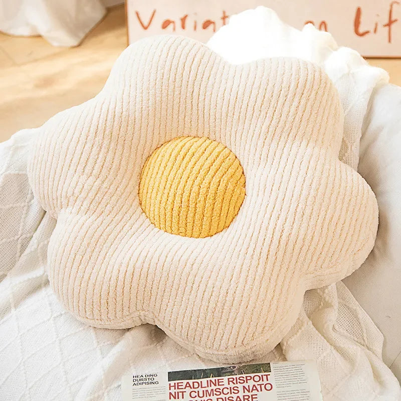 Kawaii plush toy shaped like a fried egg on a soft surface