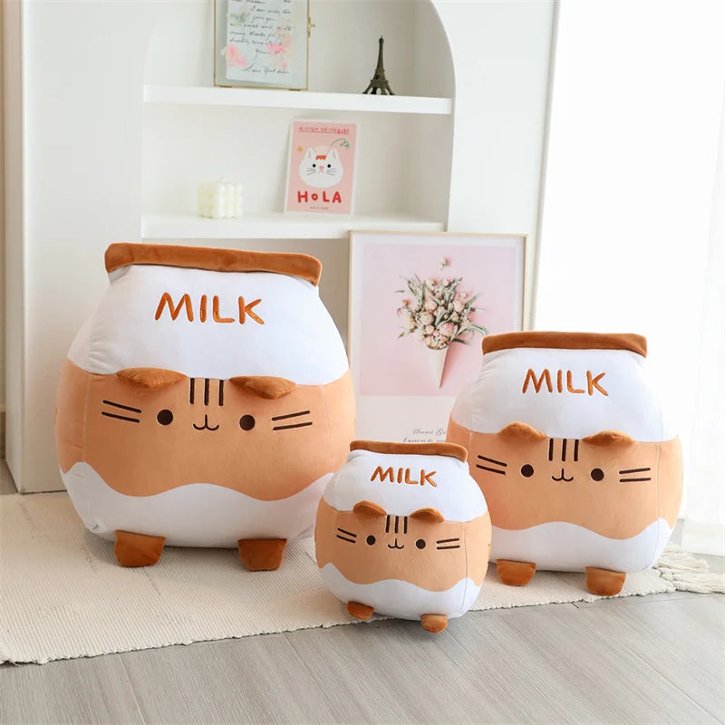Three cute kawaii plush toys shaped like milk cartons with cat faces on a wooden floor.