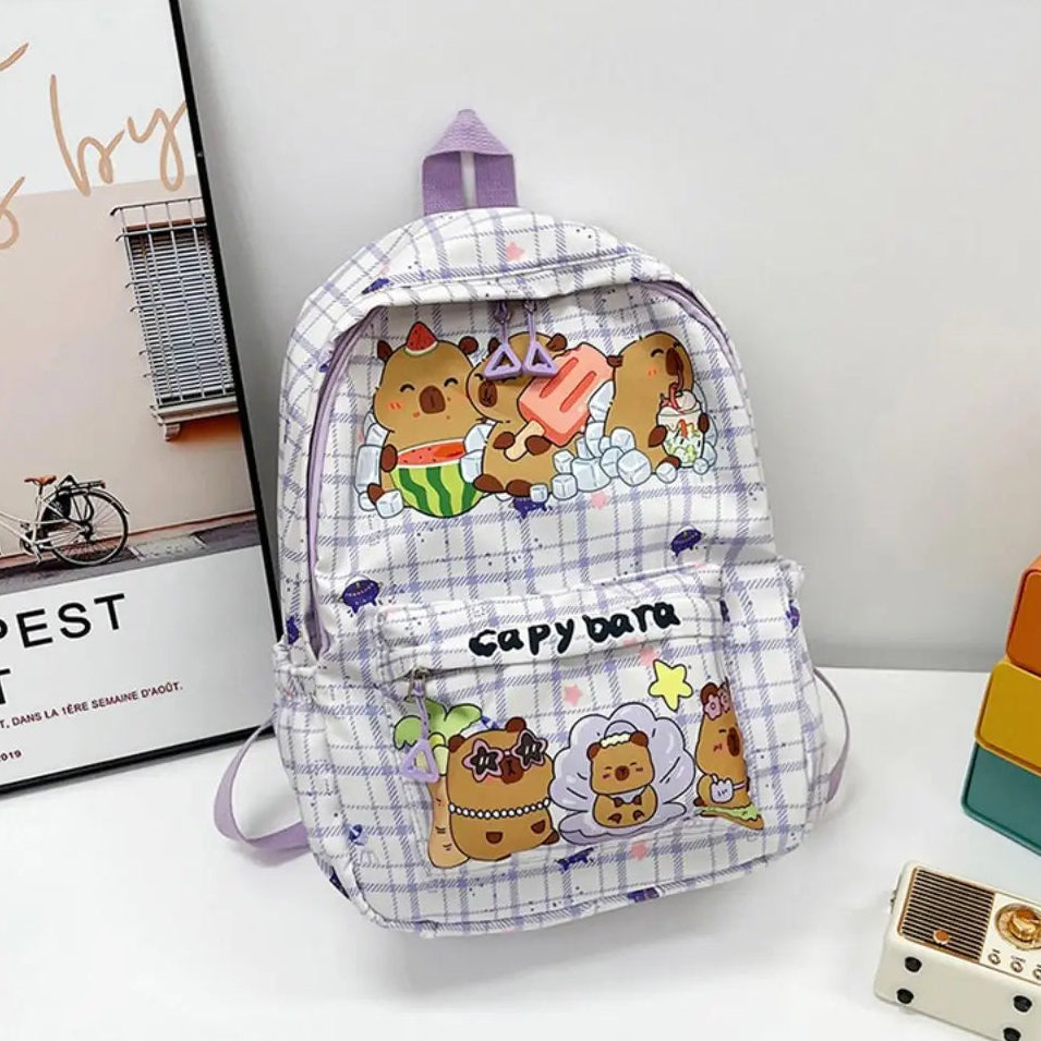 Backpack with Kawaii cartoon character design on a white surface