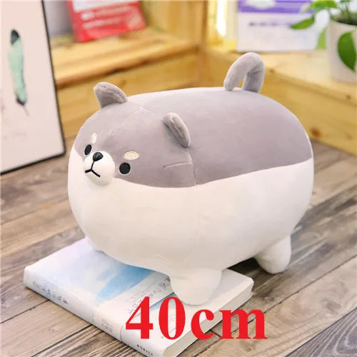 Plush kawaii toy resembling a dog on a wooden floor with '40cm' text