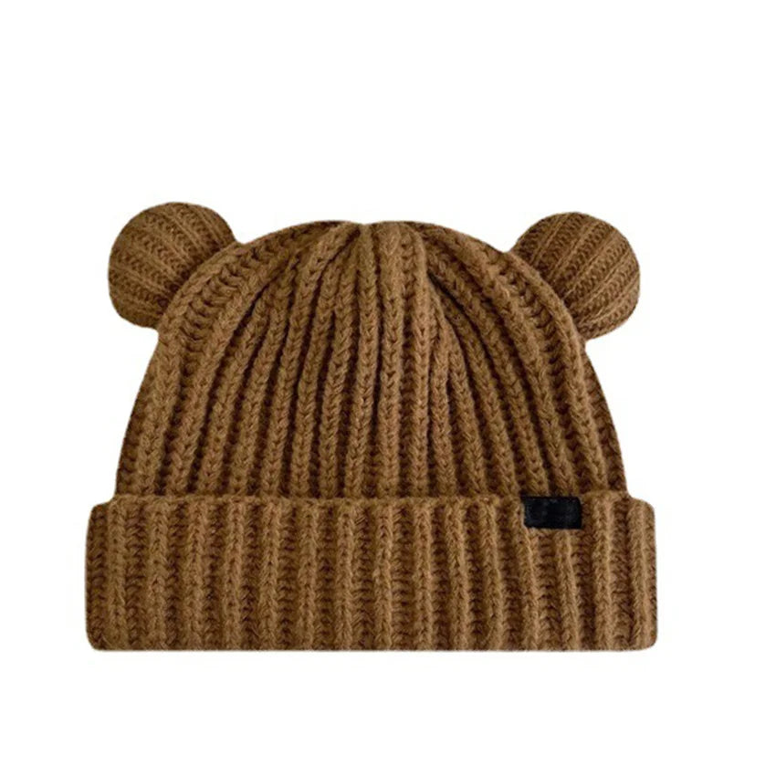 Brown knit beanie with Kawaii bear ears on a white background