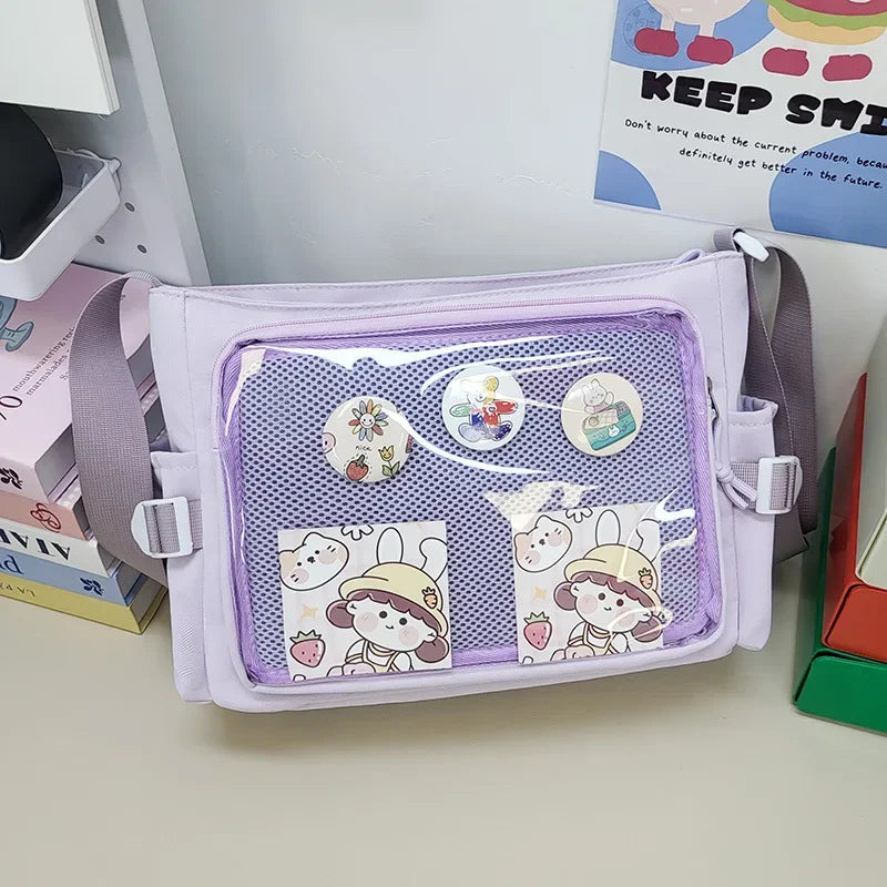 Purple pouch with Kawaii cartoon designs on a shelf with books and toys