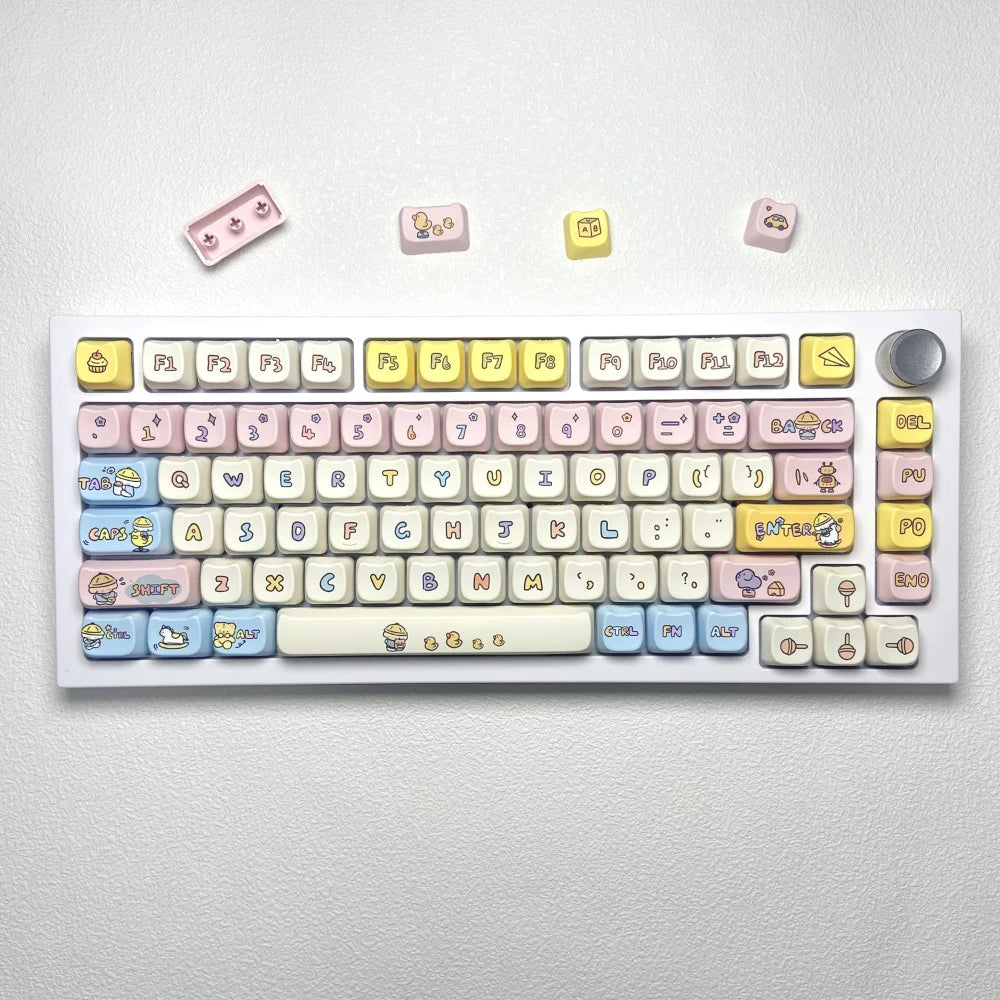 Keyboard with Kawaii colorful keycaps on a white background
