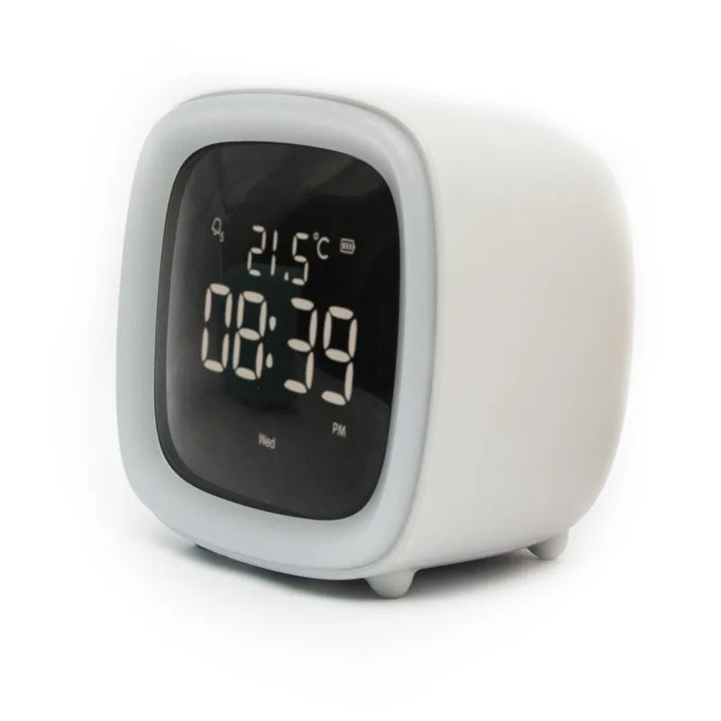 White kawaii digital clock with temperature and time display on a white background