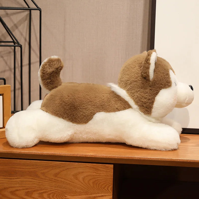 Plush dog kawaii toy on a wooden surface with a neutral background