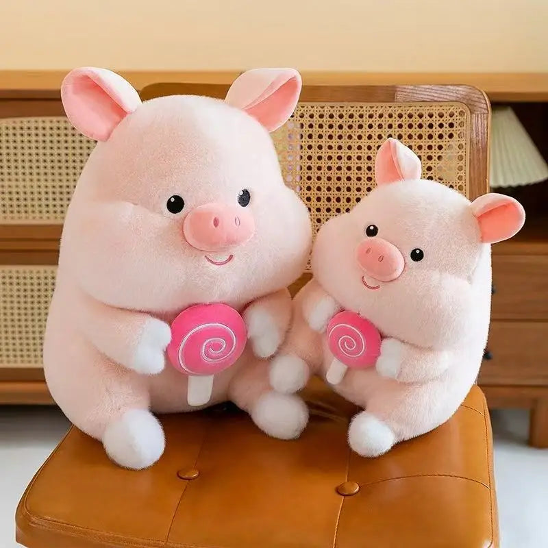 Two pink kawaii plush pigs sitting on a brown chair.