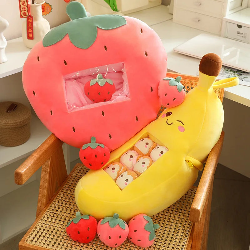 Plush kawaii toys shaped like a strawberry and banana on a chair