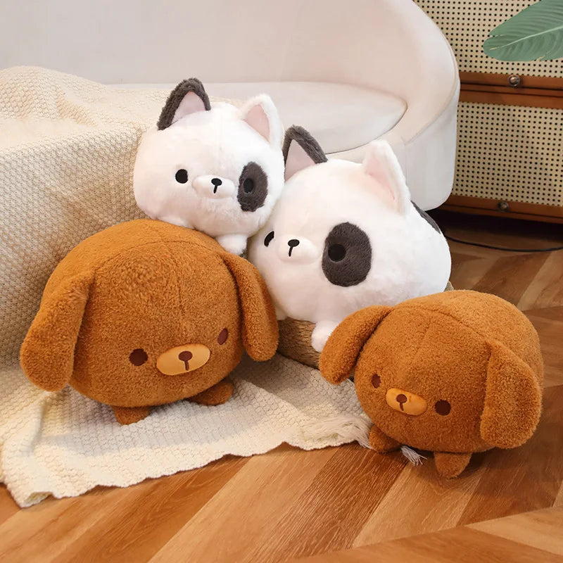 Four plush kawaii toys, including a white cat, brown dog, and two smaller brown dogs, on a wooden floor.