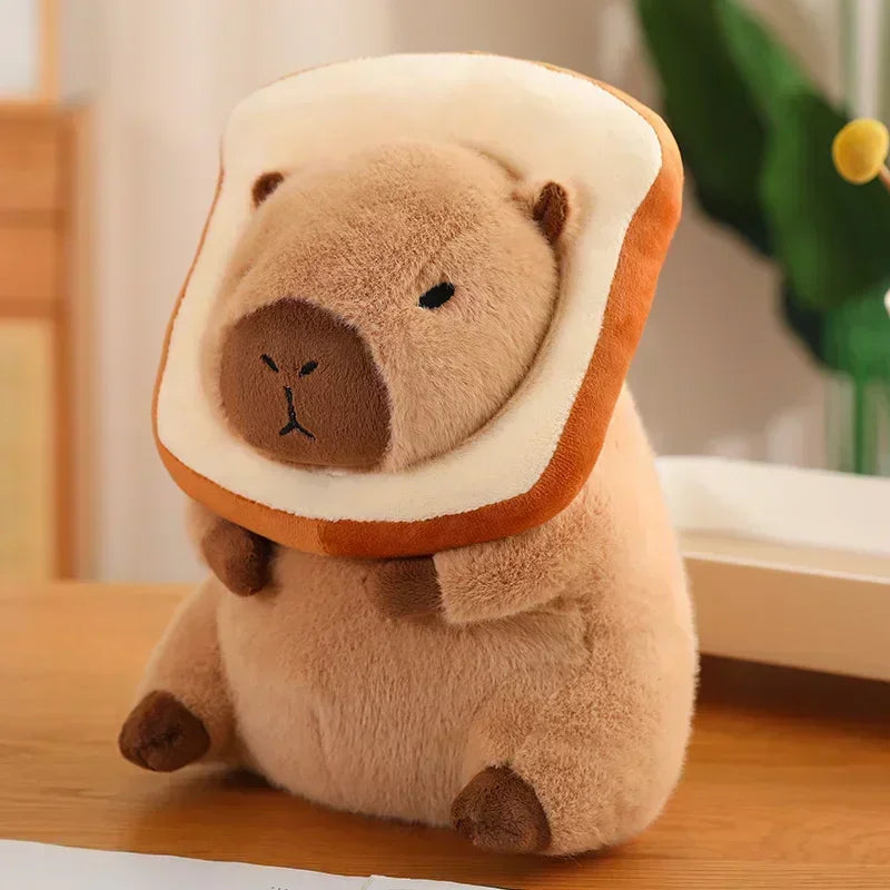 Plush kawaii toy shaped like a bear in a slice of bread on a wooden surface.