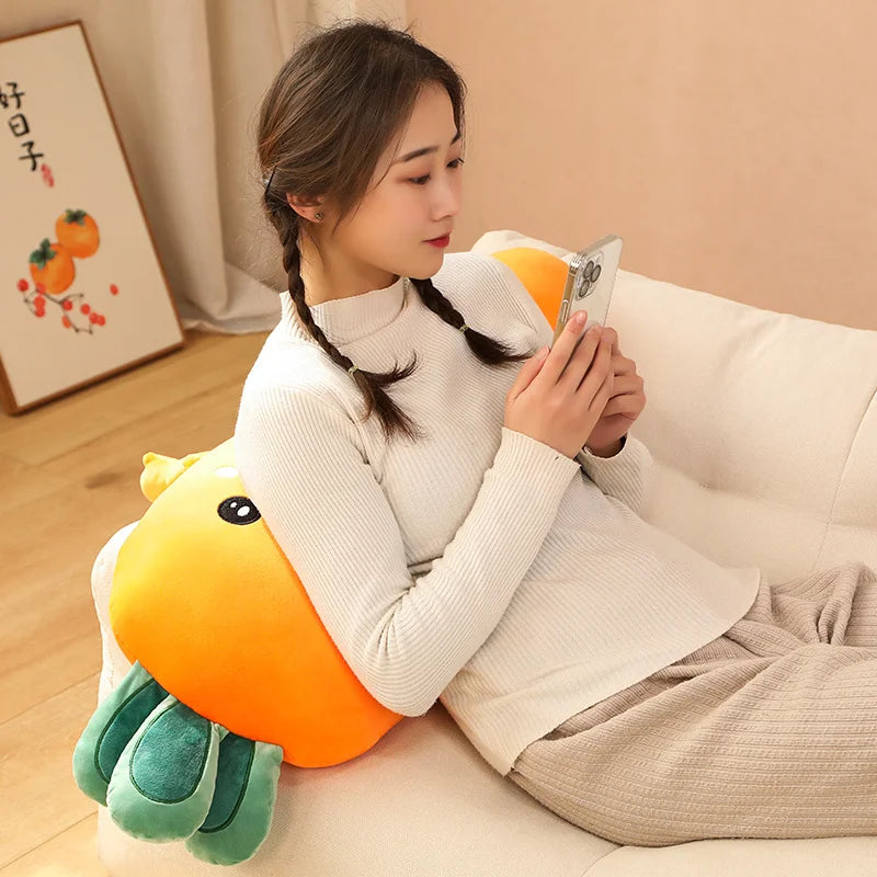 Woman sitting on a couch with a large kawaii plush toy resembling a dragon, holding a phone.
