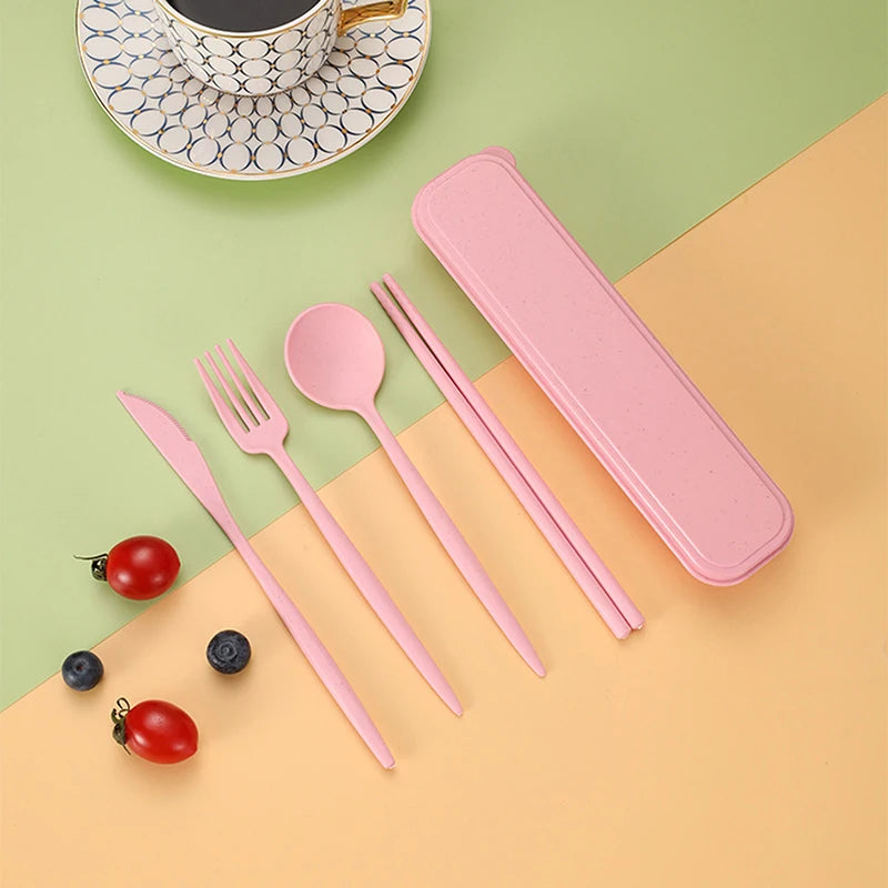 Pink kawaii cutlery set with case on a colorful background