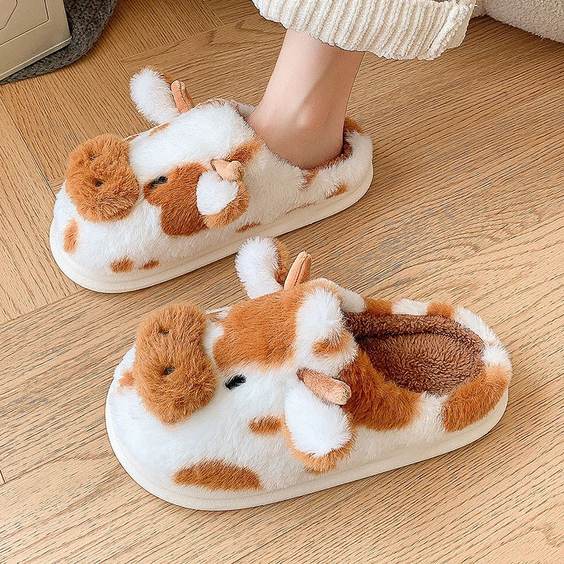 Pair of kawaii cartoonish animal slippers on a wooden floor