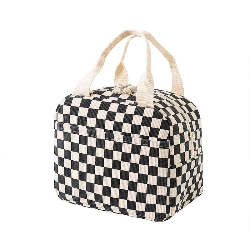 Black and white kawaii checkered bag with a handle on a white background