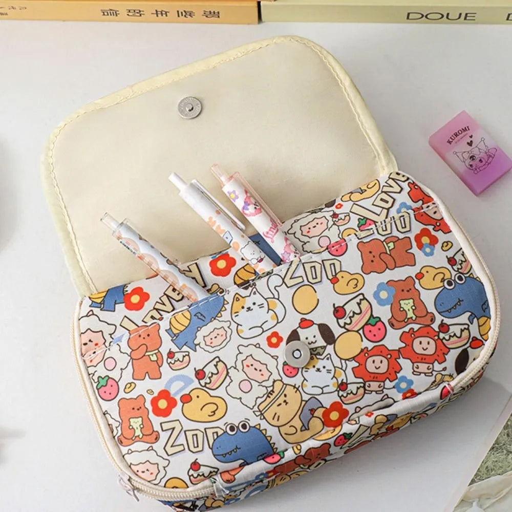 Kawaii-themed pencil case with cartoon characters and pens on a white surface.