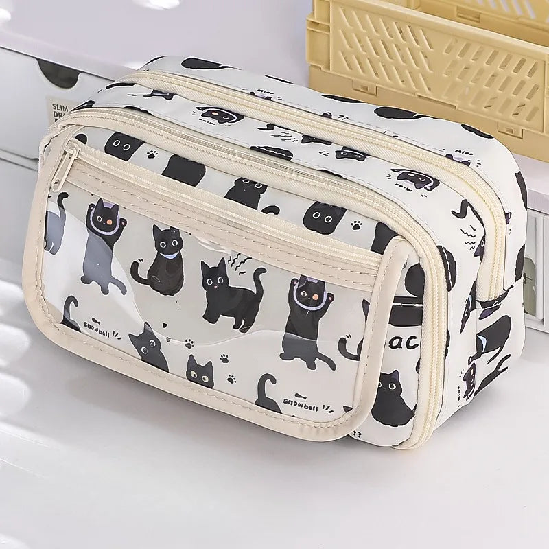 Pencil case with black kawaii cat pattern on a white surface
