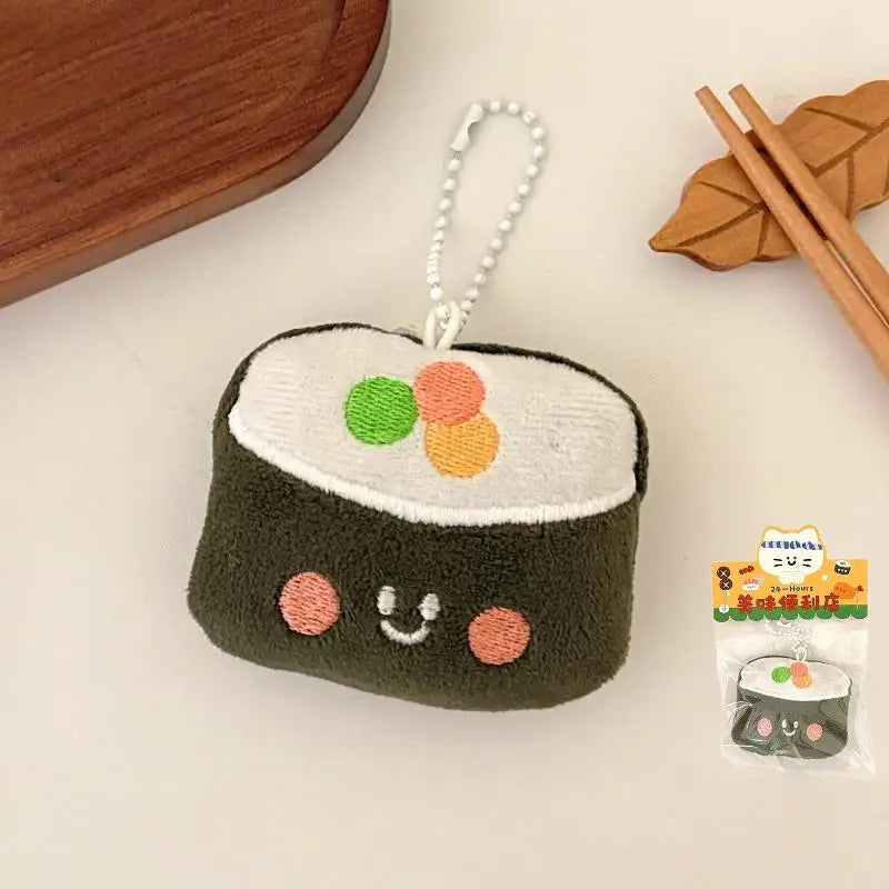 Plush kawaii sushi toy with a smiley face on a light background