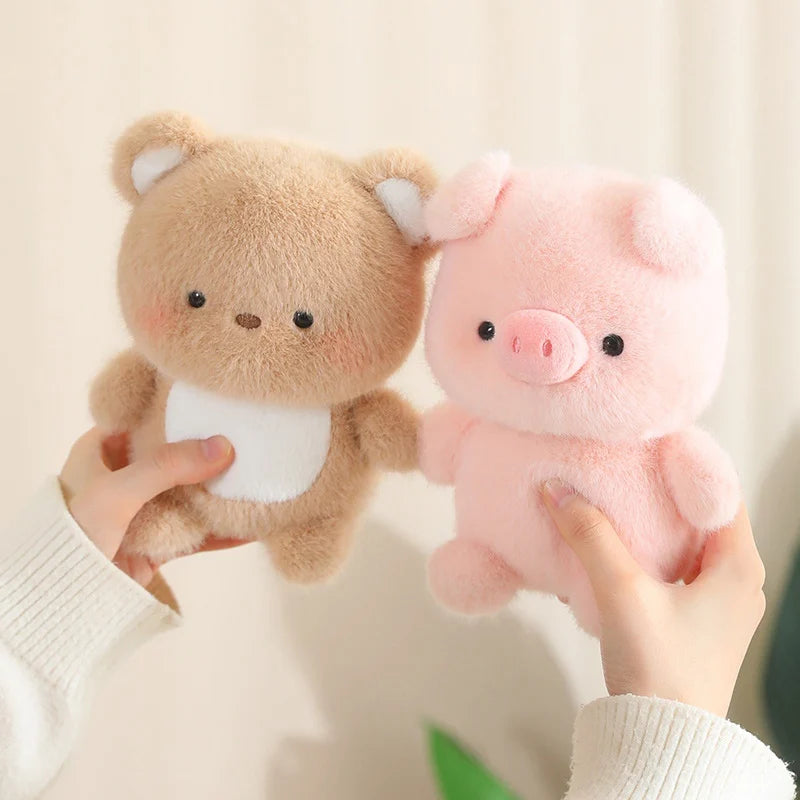 Two plush kawaii toys, a brown bear and a pink pig, held by hands against a neutral background.