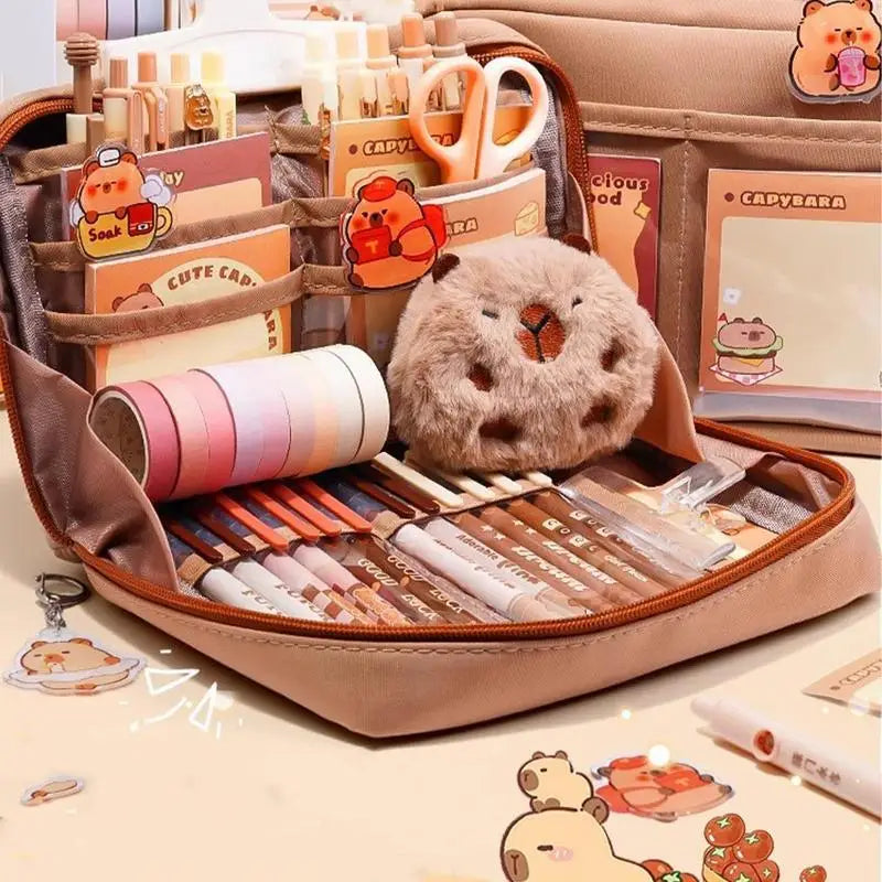 Stationery set with kawaii cute animal-themed items including pens, markers, and a plush toy in an open beige case.