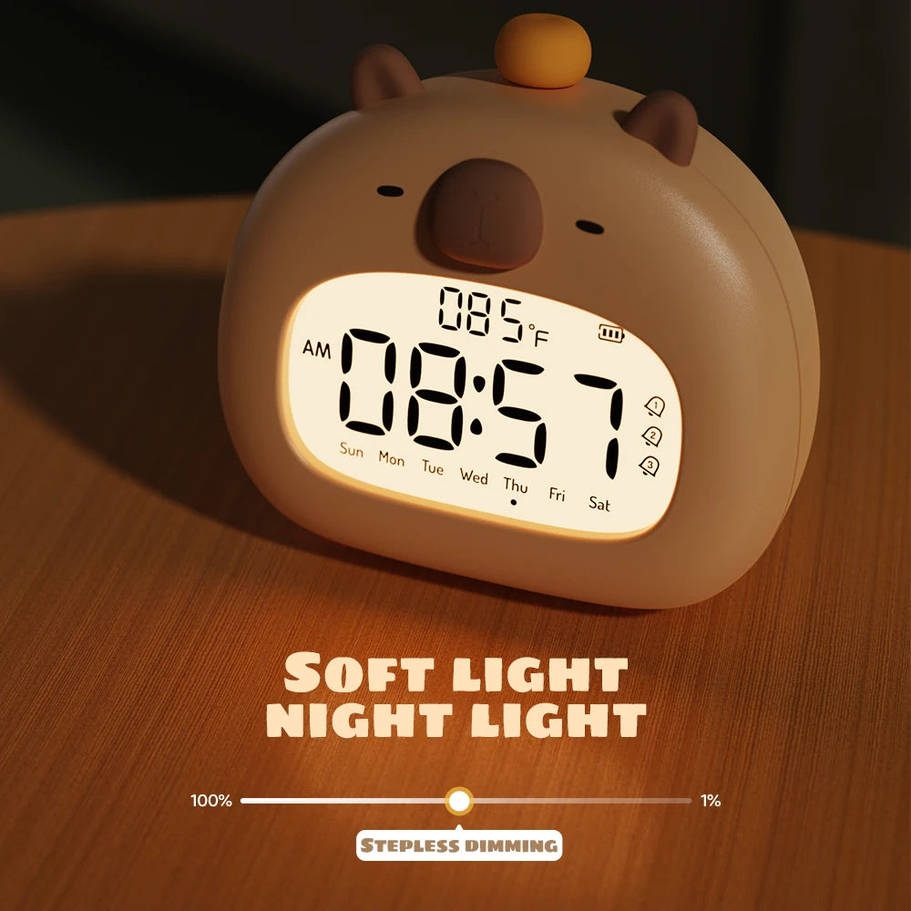 Cute animal-shaped digital clock with soft light kawaii night light feature on a wooden surface.