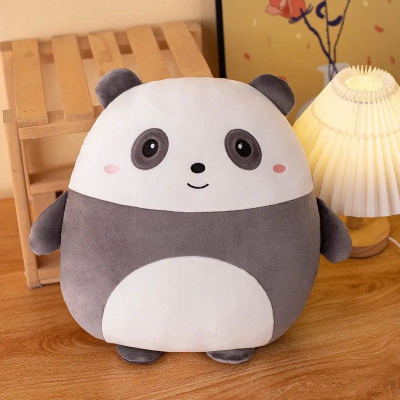 Cute panda kawaii plush toy on a wooden floor with a lamp in the background