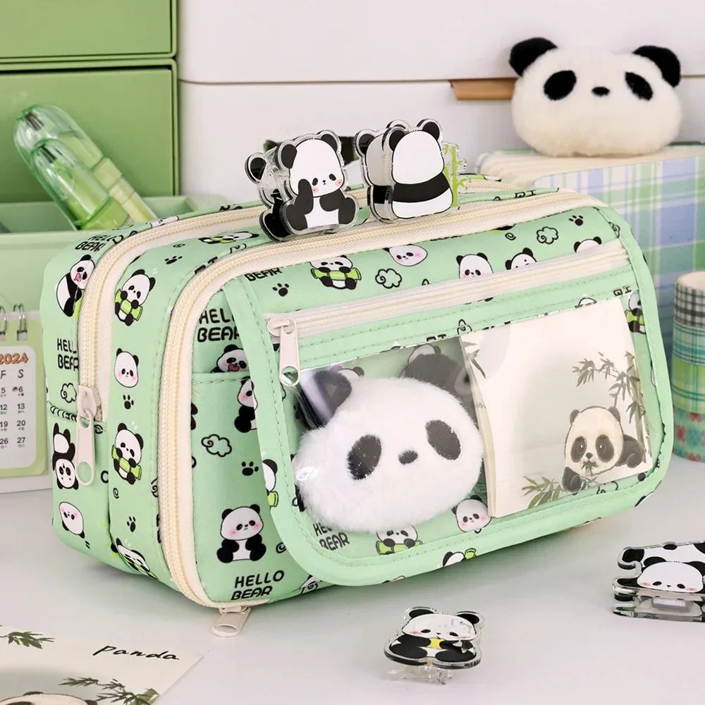 Green kawaii panda-themed pouch with plush toys on a white surface