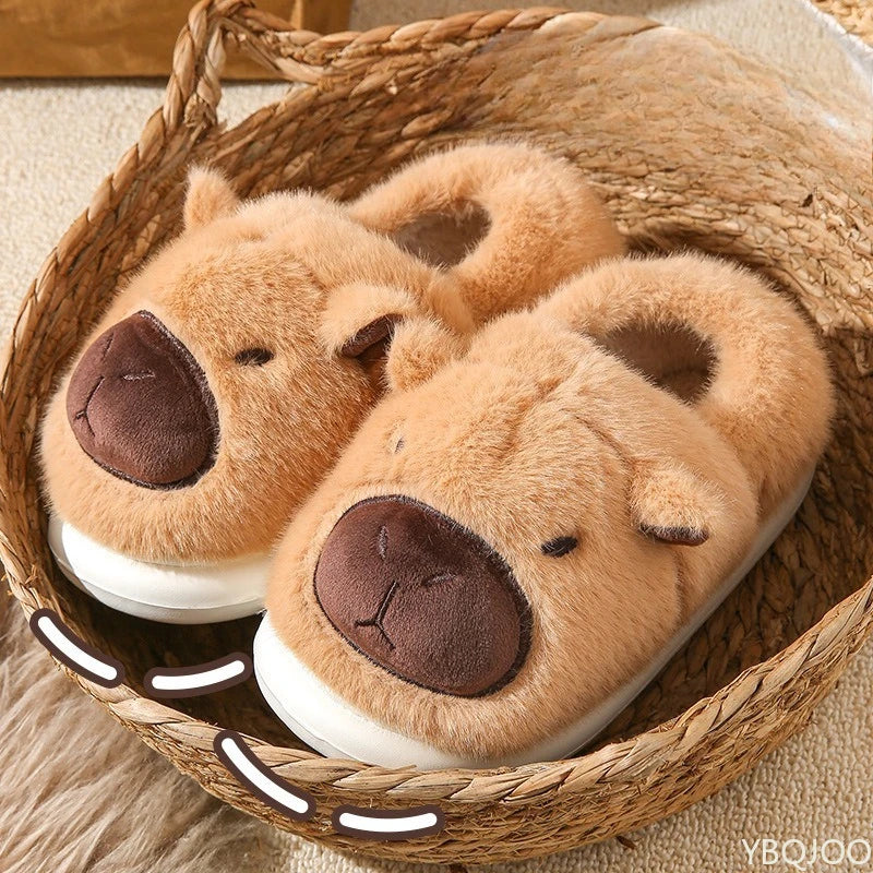 Pair of teddy bear kawaii slippers in a woven basket on a soft surface.