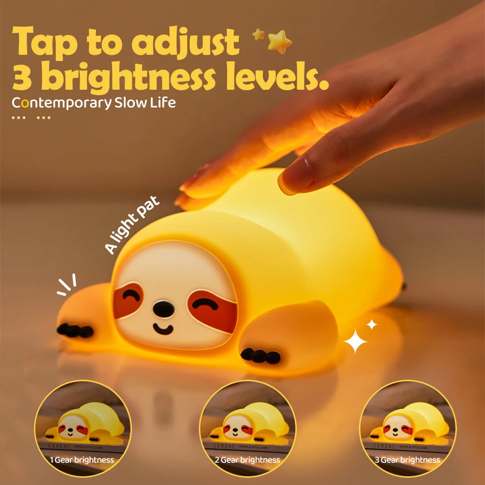 Kawaii sloth-shaped night light with a hand adjusting brightness levels on a warm background.