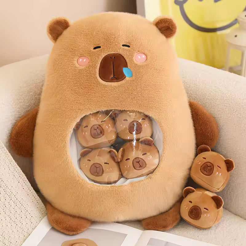 Kawaii plush bear-shaped container with smaller bear plushies inside on a couch.