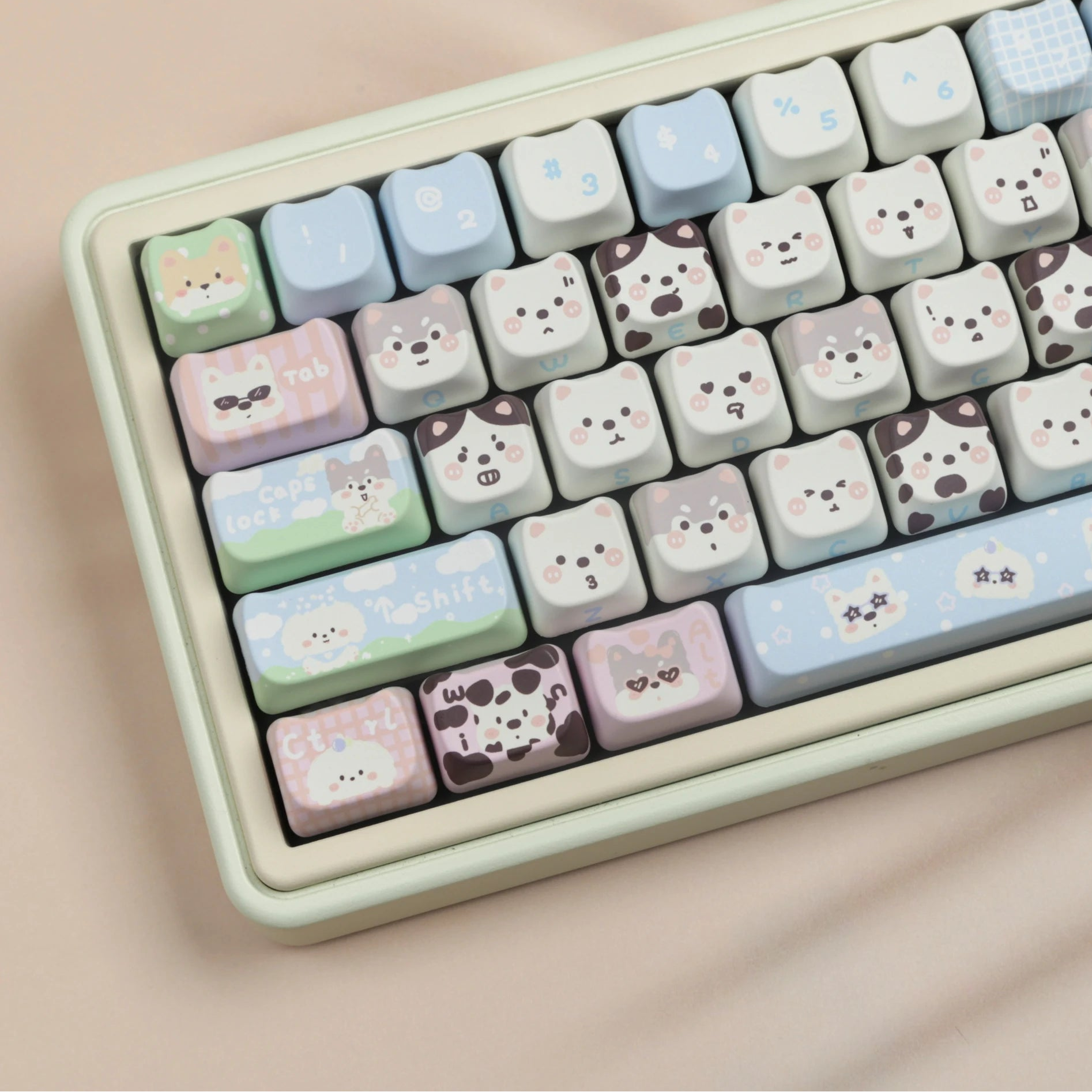 Keyboard with kawaii cute animal-themed keycaps on a beige background, featuring the brand 'JAYCOMIA'.